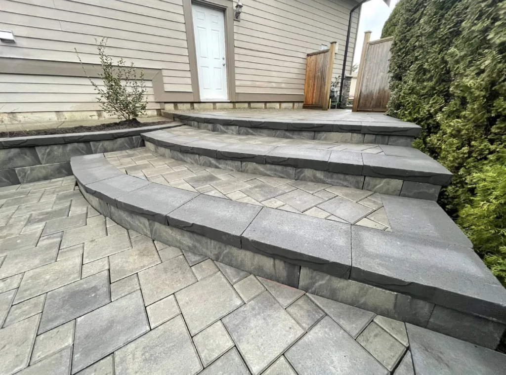 Close up of curved steps built using Allan Block